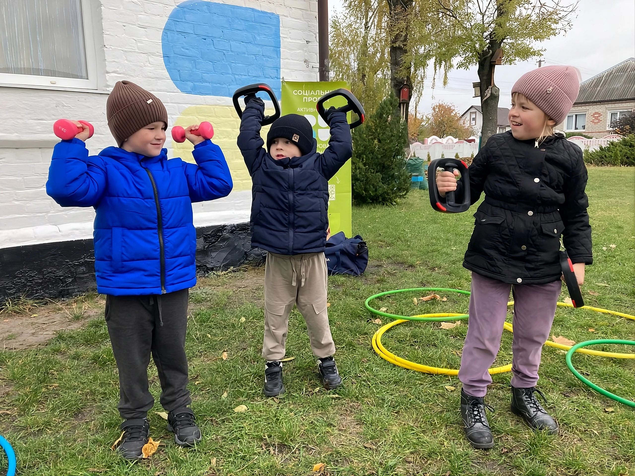 Kids using donated gym equipment